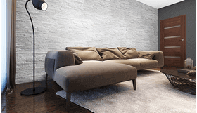 Helles Naturstein als decorative Wand in einem modernen Wohnzimmer